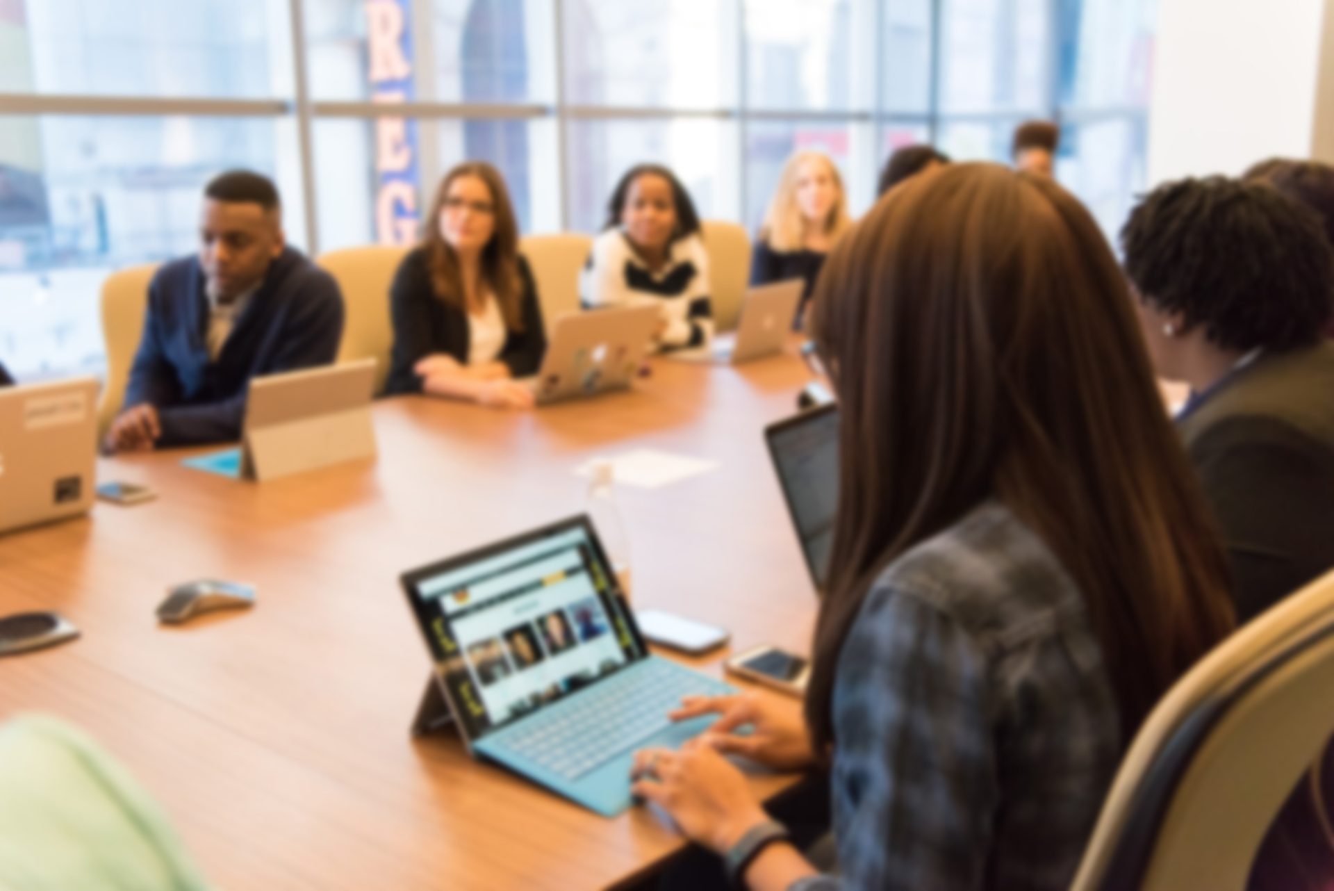 people sitting in meeting